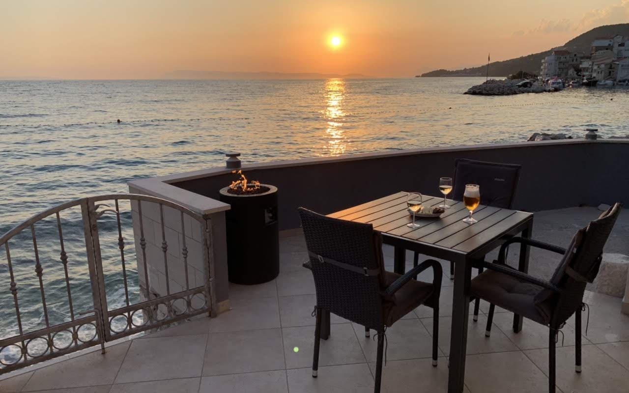 LAVA TUBE fire pit on a terrace overlooking the sea