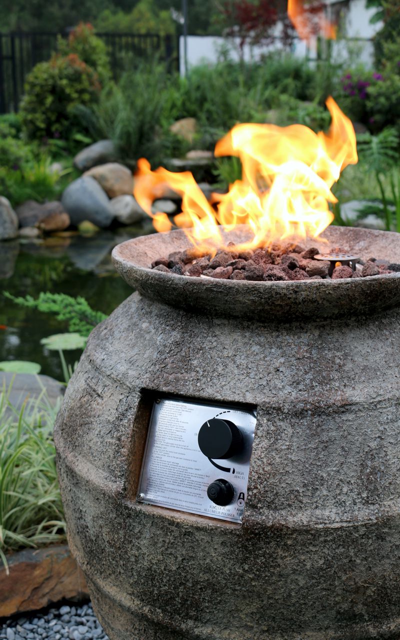 The stone texture of the POMPEI POT fire pit up close