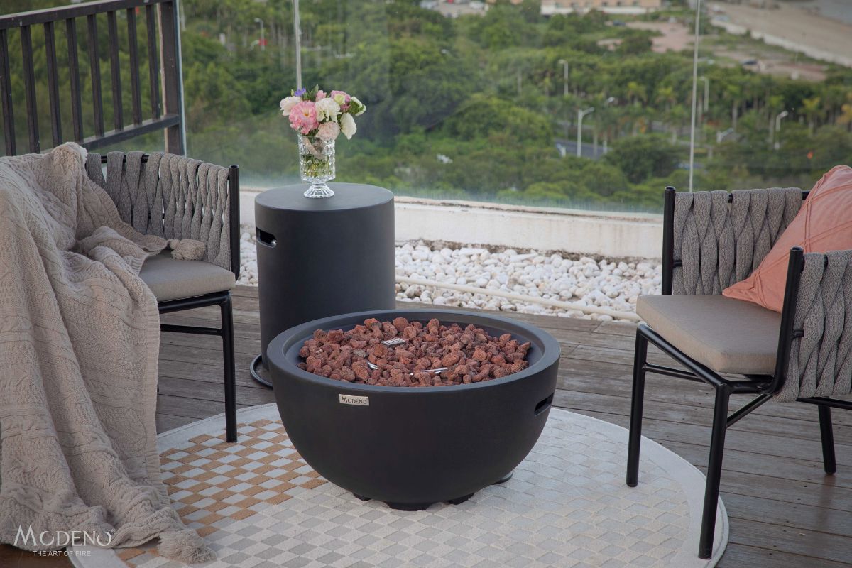 JEFFERSON fire pit on a terrace with garden furniture