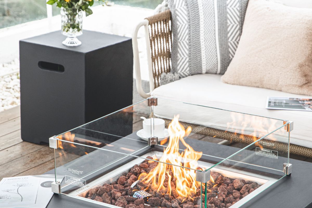 Black XL bottle cover by the AURORA fire pit