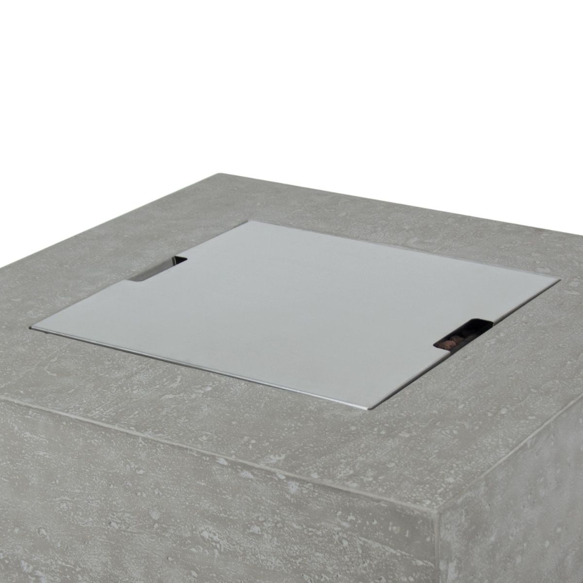 Stainless steel lid in the opening of a fire pit