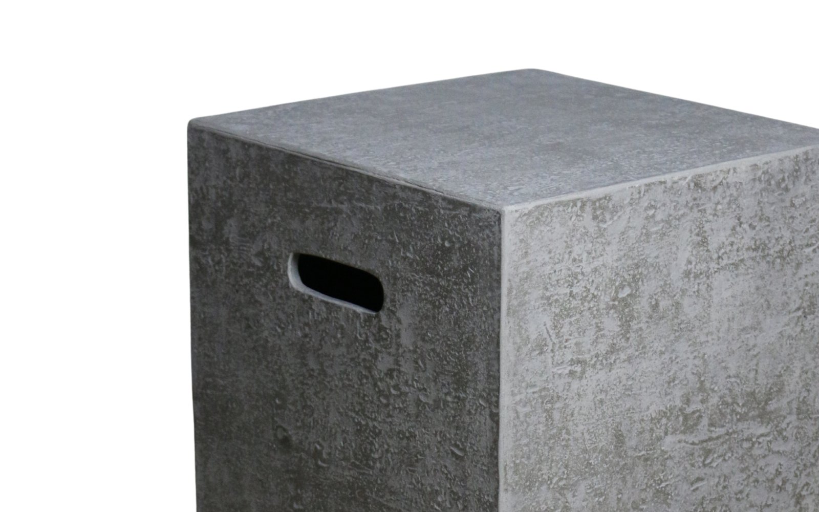 The travertine surface of the LG bottle cover up close