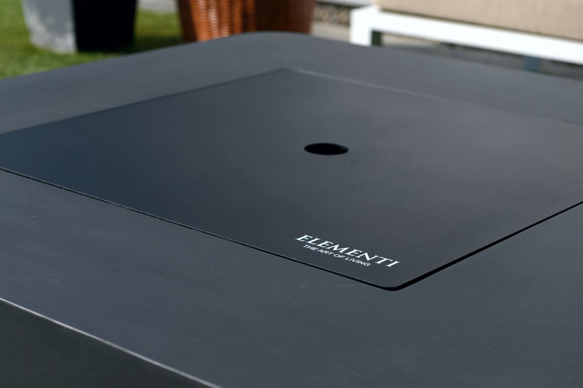 Close-up of the BERGAMO fire pit lid with the ELEMENTI logo