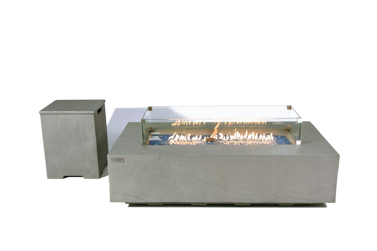 METEORA table with the glass wind guard and bottle cover