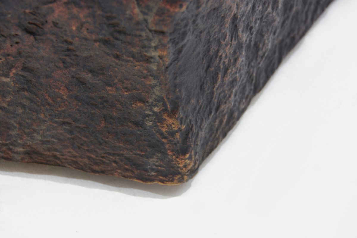 The stone texture of the COLUMBIA fire pit up close