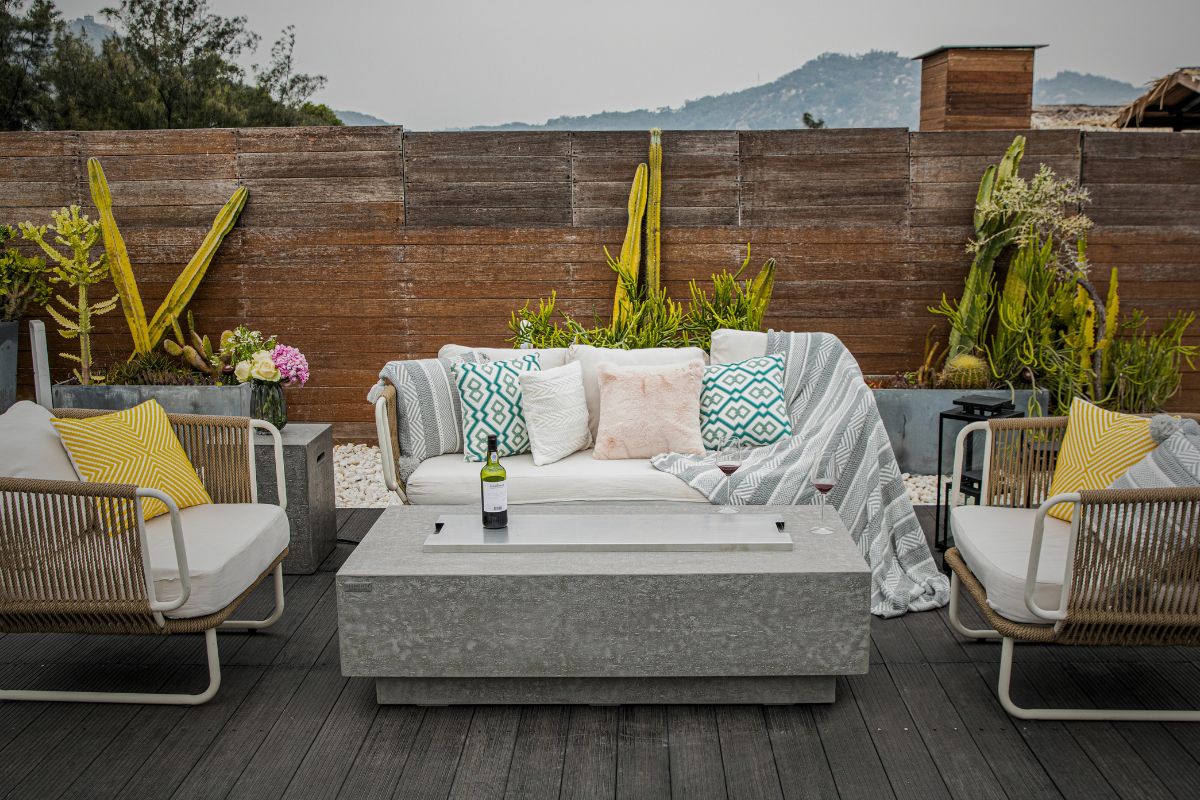 KINGSALE table on a terrace with a lounge set