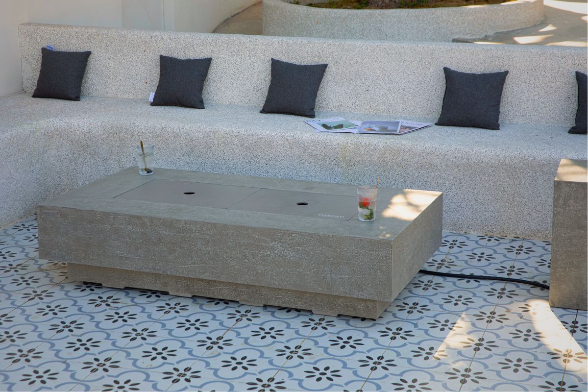 RIVIERA table with the fire pit lid on