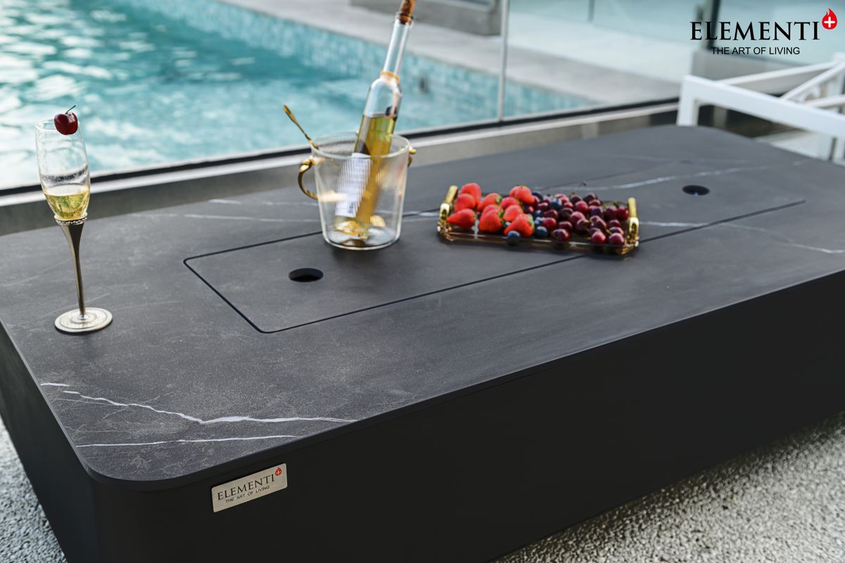 The black marble décor porcelain top of the VALENCIA table with the lid on